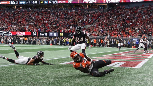 Sep 30, 2018; Atlanta, GA, USA; Cincinnati Bengals wide receiver A.J. Green (18) catches the game-winning touchdown against Atlanta Falcons cornerback Isaiah Oliver (20) and cornerback Brian Poole (34) in the fourth quarter at Mercedes-Benz Stadium. Photo Credit: Jason Getz-USA TODAY Sports
