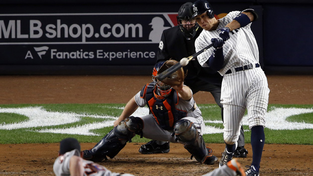 Oct 16, 2017; Bronx, NY, USA; New York Yankees right fielder Aaron Judge (99) hits a three run home run during the fourth inning against the Houston Astros during game three of the 2017 ALCS playoff baseball series at Yankee Stadium. Photo Credit: Adam Hunger-USA TODAY Sports