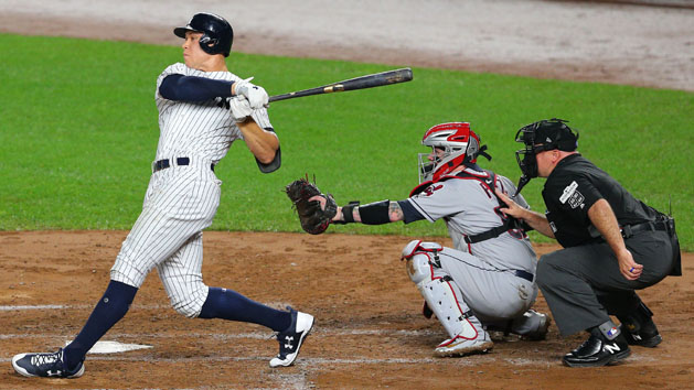 October 9, 2017; Bronx, NY, USA; New York Yankees right fielder Aaron Judge (99) hits a two run RBI double against the Cleveland Indians in the second inning during game four of the 2017 ALDS playoff baseball series at Yankee Stadium. Photo Credit: Brad Penner-USA TODAY Sports