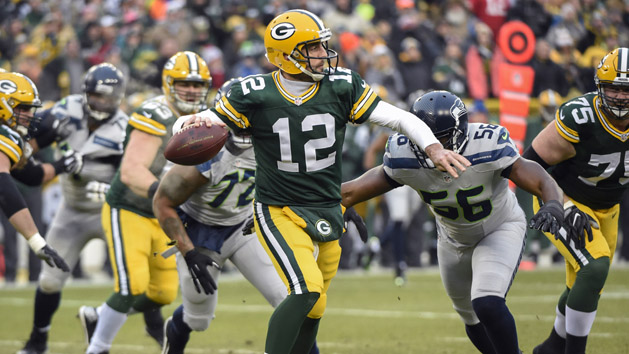 Nov 20, 2016; Landover, MD, USA; Green Bay Packers quarterback Aaron Rodgers (12) attempts a pass against the Washington Redskins during the second half at FedEx Field. Photo Credit: Brad Mills-USA TODAY Sports