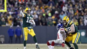 Rodgers leads Packers to NFC North title