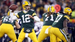 Rodgers throws six first-half TDs in rout of Bears