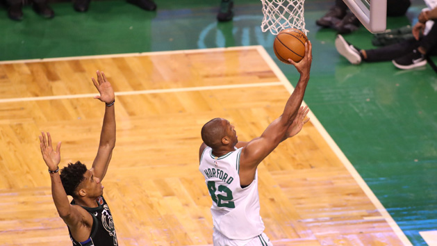 Apr 15, 2018; Boston, MA, USA; Boston Celtics forward Al Horford (42) shoots the ball past Milwaukee Bucks forward Giannis Antetokounmpo (34) in the second half in game one of the first round of the 2018 NBA Playoffs between the Boston Celtics and Milwaukee Bucks at TD Garden. Photo Credit: Paul Rutherford-USA TODAY Sports