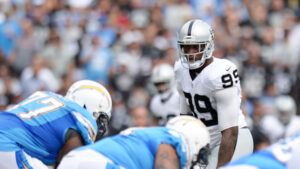 Raiders sign banned OLB Smith to $11 million deal