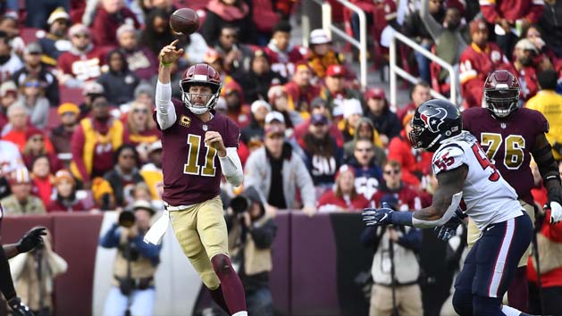 Nov 26, 2017; Kansas City, MO, USA; Kansas City Chiefs quarterback Alex Smith (11) throws a pass to Kansas City Chiefs running back Charcandrick West (35) in the second half of the game against the Buffalo Bills at Arrowhead Stadium. Photo Credit: Jay Biggerstaff-USA TODAY Sports