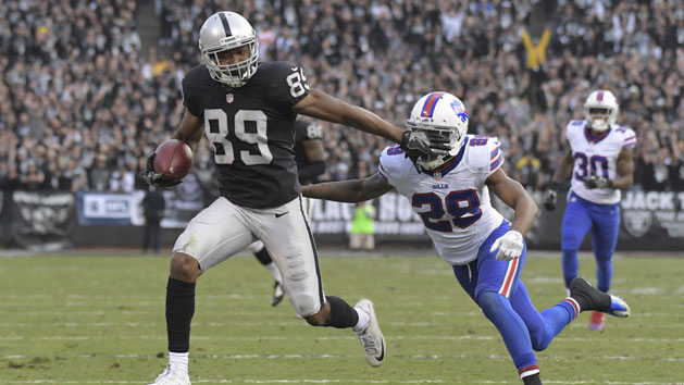 Dec 4, 2016; Oakland, CA, USA; Oakland Raiders wide receiver Amari Cooper (89) is defended by Buffalo Bills cornerback Kevon Seymour (29) on a 37-yard touchdown reception in the fourth quarter during a NFL football game at Oakland Coliseum. The Raiders defeated the Bills 38-24. Photo Credit: Kirby Lee-USA TODAY Sports