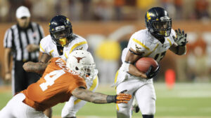 Buie’s big day lead West Virginia past Texas