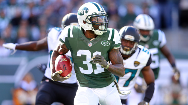 Nov 8, 2015; East Rutherford, NJ, USA; New York Jets cornerback Antonio Cromartie (31) runs back a kick against the Jacksonville Jaguars during the first quarter at MetLife Stadium. Mandatory Credit: Brad Penner-USA TODAY Sports