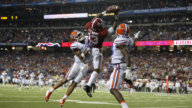 Dec 5, 2015; Atlanta, GA, USA; Alabama Crimson Tide wide receiver ArDarius Stewart (13) makes a 32 yard touchdown catch against Florida Gators defensive back Vernon Hargreaves III (1) and defensive back Marcus Maye (20) during the third quarter of the 2015 SEC Championship Game at the Georgia Dome. Mandatory Credit: Jason Getz-USA TODAY Sports