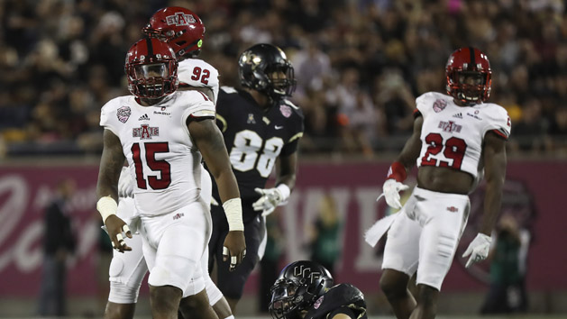 Dec 17, 2016; Orlando , FL, USA; Arkansas State Red Wolves linebacker Kyle Wilson (15) reacts after tackling UCF Knights quarterback McKenzie Milton (10) in the first quarter at Citrus Bowl Stadium. Photo Credit: Logan Bowles-USA TODAY Sports