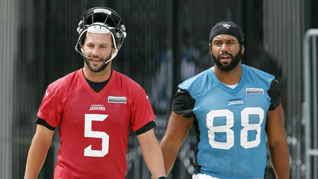 Jun 14, 2018; Jacksonville, FL, USA; Jacksonville Jaguars quarterback Blake Bortles (5) and tight end Austin Seferian-Jenkins (88) walk to the field during mini camp at the Dream Finders Homes Practice Facility. Mandatory Credit: Reinhold Matay-USA TODAY Sports