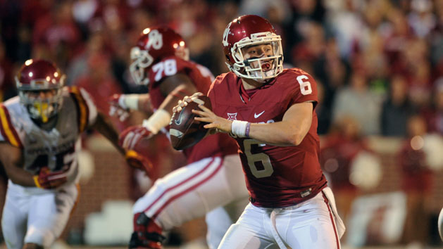 Nov 7, 2015; Norman, OK, USA; Oklahoma Sooners quarterback Baker Mayfield (6) looks to pass the ball against the Iowa State Cyclones during the second quarter at Gaylord Family - Oklahoma Memorial Stadium. Mandatory Credit: Mark D. Smith-USA TODAY Sports
