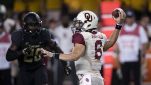 No. 3 Sooners rally to defeat Baylor 49-41