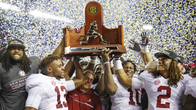 Dec 3, 2016; Atlanta, GA, USA; Alabama Crimson Tide head coach Nick Saban celebrates winning the trophy with his team after the SEC Championship college football game against the Florida Gators at Georgia Dome. Alabama defeated Florida 54-16. Photo Credit: Jason Getz-USA TODAY Sports