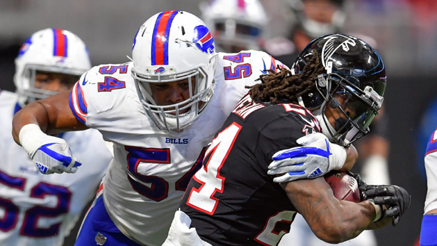 Oct 1, 2017; Atlanta, GA, USA; Atlanta Falcons running back Devonta Freeman (24) is tackled by Buffalo Bills linebacker Eddie Yarbrough (54) during the fourth quarter at Mercedes-Benz Stadium. Photo Credit: Dale Zanine-USA TODAY Sports