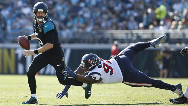 Dec 17, 2017; Jacksonville, FL, USA; Houston Texans defensive tackle Angelo Blackson (97) chases Jacksonville Jaguars quarterback Blake Bortles (5) out of the pocket during the first quarter at EverBank Field. Photo Credit: Reinhold Matay-USA TODAY Sports
