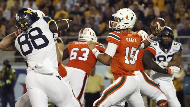 Dec 28, 2016; Orlando, FL, USA; Miami Hurricanes quarterback Brad Kaaya (15) throws the ball in the second quarter against the West Virginia Mountaineers at Camping World Stadium. Photo Credit: Logan Bowles-USA TODAY Sports