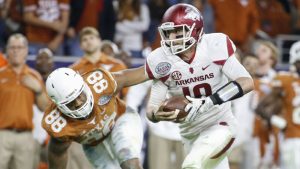 Arkansas plows over Texas to finish strong