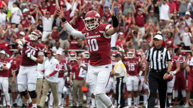Sep 5, 2015; Fayetteville, AR, USA; Arkansas Razorbacks quarterback Brandon Allen (10) celebrates throwing a touchdown against the UTEP Miners during the first quarter at Donald W. Reynolds Razorback Stadium. Mandatory Credit: Jerome Miron-USA TODAY Sports