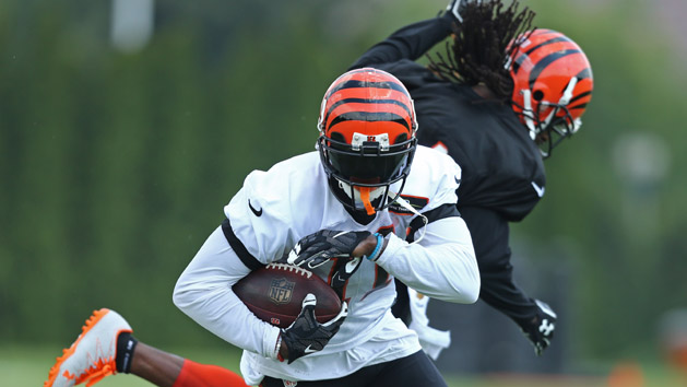 Jul 29, 2016; Cincinnati, OH, USA; Cincinnati Bengals wide receiver Brandon LaFell (11) makes a move past cornerback Adam Jones (24) during training camp at Paul Brown Stadium. Photo Credit: Aaron Doster-USA TODAY Sports