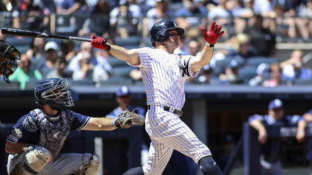 Jul 27, 2017; Bronx, NY, USA; New York Yankees left fielder Brett Gardner (11) is congratulated after hitting a walk off game winning home run against the Tampa Bay Rays during the eleventh inning at Yankee Stadium. Photo Credit: Andy Marlin-USA TODAY Sports