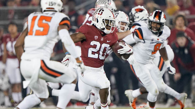 Nov 10, 2018; Stanford, CA, USA; Stanford Cardinal running back Bryce Love (20) runs with the football against the Oregon State Beavers during the first quarter at Stanford Stadium. Photo Credit: Stan Szeto-USA TODAY Sports