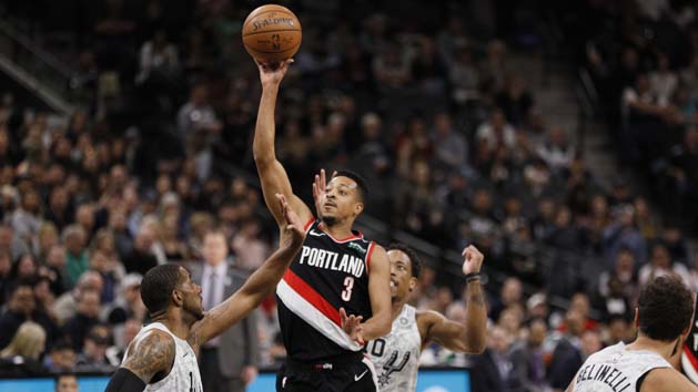 Mar 16, 2019; San Antonio, TX, USA; Portland Trail Blazers shooting guard CJ McCollum (3) shoots the ball over San Antonio Spurs power forward LaMarcus Aldridge (12) during the first half at AT&T Center. Photo Credit: Soobum Im-USA TODAY Sports