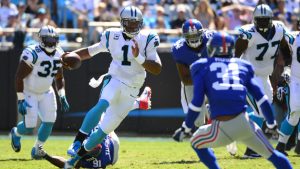 Panthers take down Saints 35-27 behind Newton