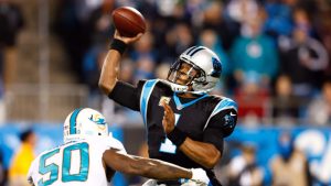 Panthers maul Fins behind Newton’s 4 TD passes