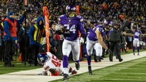 Vikings clinch playoff berth with rout of Giants