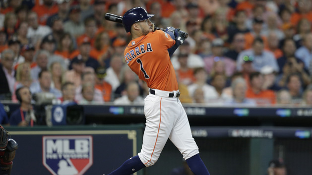 Oct 6, 2017; Houston, TX, USA; Houston Astros shortstop Carlos Correa (1) hits a two-run home run during the first inning in game two of the 2017 ALDS playoff baseball series against the Boston Red Sox at Minute Maid Park. Photo Credit: Thomas B. Shea-USA TODAY Sports