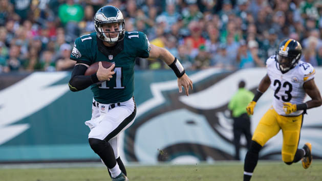 Sep 25, 2016; Philadelphia, PA, USA; Philadelphia Eagles quarterback Carson Wentz (11) runs with the ball past Pittsburgh Steelers free safety Mike Mitchell (23) during the second quarter at Lincoln Financial Field. Photo Credit: Bill Streicher-USA TODAY Sports