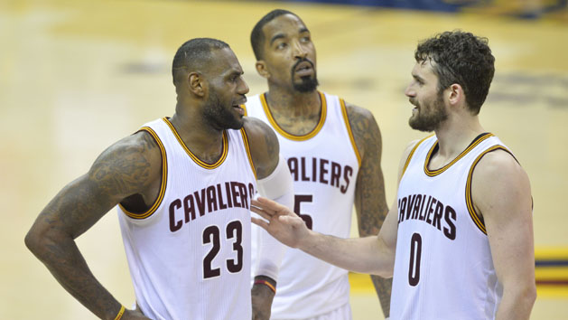 May 19, 2016; Cleveland, OH, USA; Cleveland Cavaliers forward LeBron James (23), guard J.R. Smith (5) and forward Kevin Love (0) talk in the fourth quarter against the Toronto Raptors in game two of the Eastern conference finals of the NBA Playoffs at Quicken Loans Arena. Mandatory Credit: David Richard-USA TODAY Sports