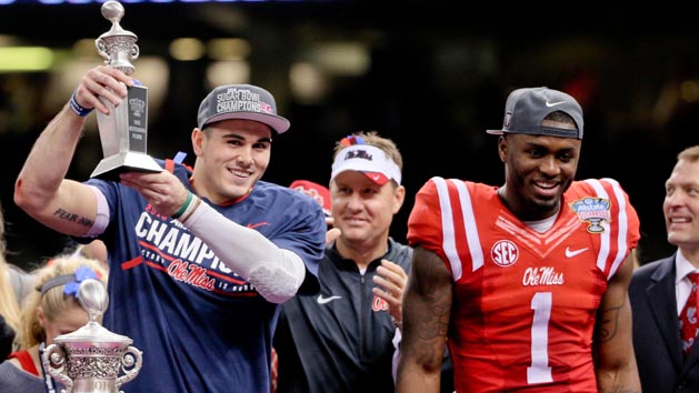 Jan 1, 2016; New Orleans, LA, USA; Mississippi Rebels quarterback Chad Kelly head coach Hugh Freeze and wide receiver Laquon Treadwell celebrate following a win against the Oklahoma State Cowboys in the 2016 Sugar Bowl at the Mercedes-Benz Superdome. Mandatory Credit: Derick E. Hingle-USA TODAY Sports