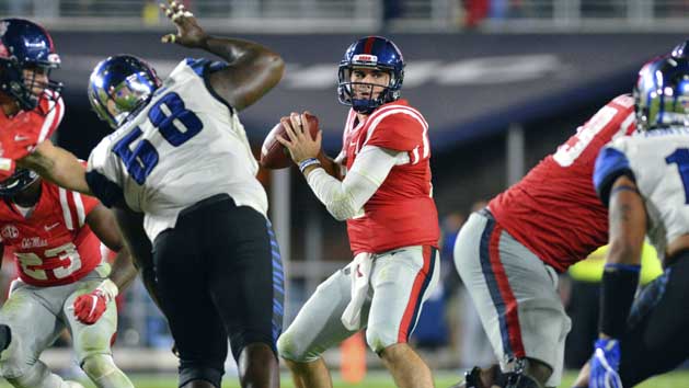 Oct 1, 2016; Oxford, MS, USA; Mississippi Rebels quarterback Chad Kelly (10) drops back in the pocket during the fourth quarter of the game against the Memphis Tigers at Vaught-Hemingway Stadium. Mississippi won 48-28. Photo Credit: Matt Bush-USA TODAY Sports