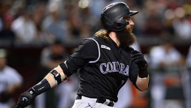 Jun 18, 2019; Phoenix, AZ, USA; Colorado Rockies center fielder Charlie Blackmon (19) hits a single against the Arizona Diamondbacks during the seventh inning at Chase Field. Photo Credit: Joe Camporeale-USA TODAY Sports
