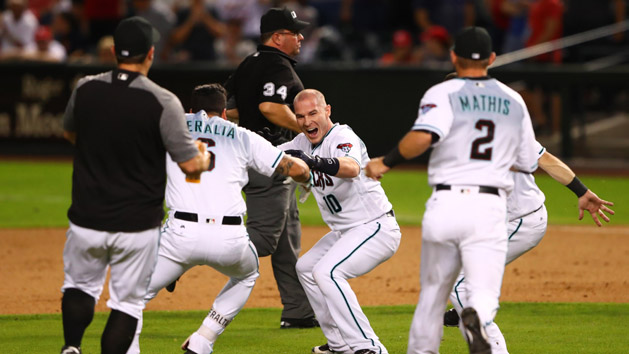 Jun 27, 2017; Phoenix, AZ, USA; Arizona Diamondbacks catcher Chris Herrmann celebrates with teammates after hitting a walk off single to defeat the St. Louis Cardinals at Chase Field. Photo Credit: Mark J. Rebilas-USA TODAY Sports