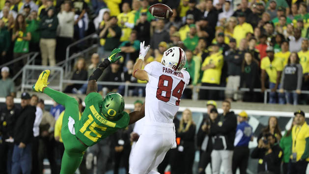 Sep 22, 2018; Eugene, OR, USA; Stanford Cardinal tight end Colby Parkinson (84) tips the ball to himself for a touchdown over Oregon Ducks cornerback Deommodore Lenoir (15) in overtime at Autzen Stadium. Photo Credit: Jaime Valdez-USA TODAY Sports