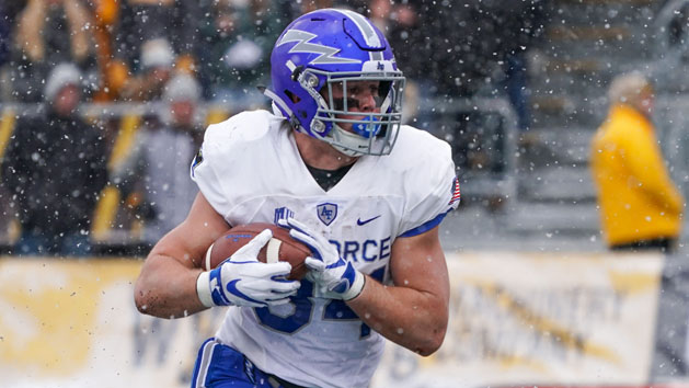 Nov 17, 2018; Laramie, WY, USA; Air Force Falcons fullback Cole Fagan (34) scores a touchdown against the Wyoming Cowboys during the second quarter at Jonah Field War Memorial Stadium. Photo Credit: Troy Babbitt-USA TODAY Sports