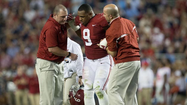 Sep 30, 2017; Tuscaloosa, AL, USA; Alabama Crimson Tide defensive lineman Da'Shawn Hand (9) is helped up after suffering an injury during a play against the Mississippi Rebels at Bryant-Denny Stadium. Photo Credit: Marvin Gentry-USA TODAY Sports