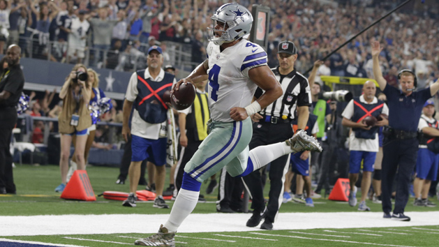 Nov 5, 2017; Arlington, TX, USA; Dallas Cowboys quarterback Dak Prescott (4) runs for a touchdown in the second quarter against the Kansas City Chiefs at AT&T Stadium. Photo Credit: Tim Heitman-USA TODAY Sports