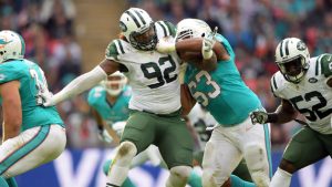 NFL Notes: Dolphins’ LG Thomas holding off Tunsil