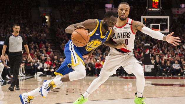 May 18, 2019; Portland, OR, USA; Golden State Warriors forward Draymond Green (23) drives to the basket against Portland Trail Blazers guard Damian Lillard (0) during the second half in game three of the Western conference finals of the 2019 NBA Playoffs at Moda Center. The Golden State Warriors beat the Portland Trail Blazers 110-99. Photo Credit: Troy Wayrynen-USA TODAY Sports