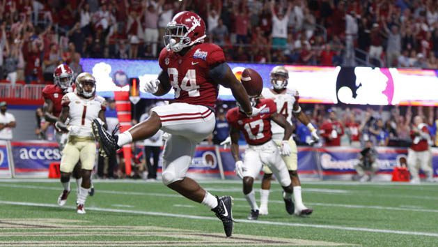 Sep 2, 2017; Atlanta, GA, USA; Alabama Crimson Tide running back Damien Harris (34) scores a touchdown and celebrates in the third quarter against the Florida State Seminoles at Mercedes-Benz Stadium. Photo Credit: Brett Davis-USA TODAY Sports