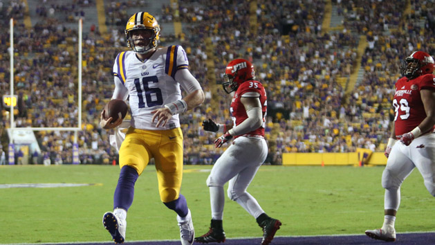 Sep 10, 2016; Baton Rouge, LA, USA; LSU Tigers quarterback Danny Etling (16) runs the ball into the end zone for a touchdown in front of Jacksonville State Gamecocks linebacker Quan Stoudemire (35) during the second half at Tiger Stadium. LSU defeated Jacksonville State 34-13. Photo Credit: Crystal LoGiudice-USA TODAY Sports