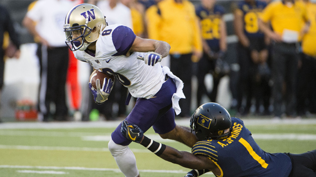 Oct 8, 2016; Eugene, OR, USA; Washington Huskies wide receiver Dante Pettis (8) picks up a first down as he is tackled by Oregon Ducks defensive back Arrion Springs (1) during the second quarter at Autzen Stadium. Photo Credit: Troy Wayrynen-USA TODAY Sports