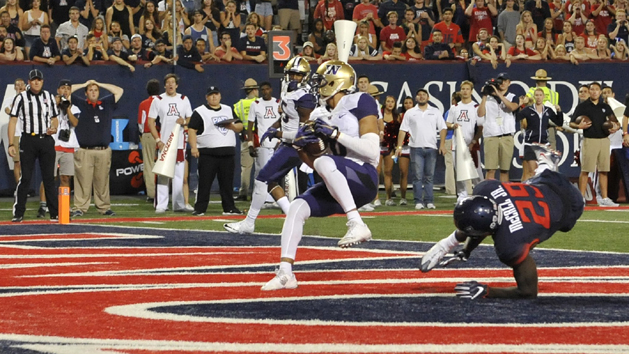 Sep 24, 2016; Tucson, AZ, USA; Washington Huskies wide receiver Dante Pettis (8) scores the game winning touchdown during overtime against the Arizona Wildcats at Arizona Stadium. Washington won 35-28 in overtime. Photo Credit: Casey Sapio-USA TODAY Sports