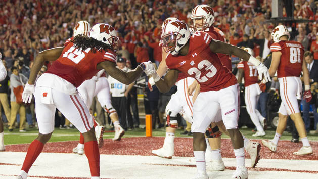 Oct 29, 2016; Madison, WI, USA; Wisconsin Badgers running back Dare Ogunbowale (23) and wide receiver Robert Wheelwright (15) celebrate after scoring a touchdown during overtime against the Nebraska Cornhuskers at Camp Randall Stadium. Wisconsin won 23-17. Photo Credit: Jeff Hanisch-USA TODAY Sports