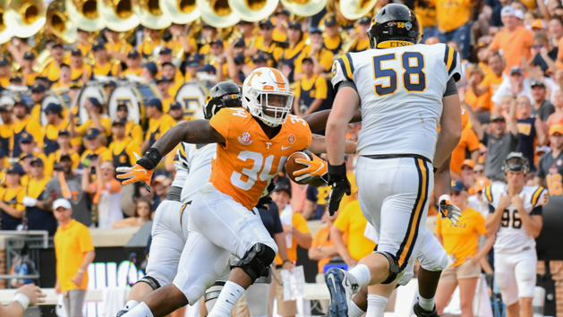 Sep 8, 2018; Knoxville, TN, USA; Tennessee Volunteers linebacker Darrin Kirkland Jr. (34) returns an interception for a touchdown against the East Tennessee State Buccaneers during the second quarter at Neyland Stadium. Photo Credit: Randy Sartin-USA TODAY Sports