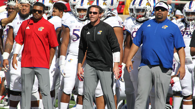 Oct 20, 2018; Lubbock, TX, USA; Kansas Jayhawks head coach David Beaty (center) looks on from the sidelines during the game against the Texas Tech Red Raiders at Jones AT&T Stadium. Photo Credit: Michael C. Johnson-USA TODAY Sports
